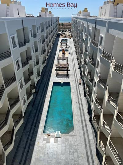 90 m² One-Bedroom Apartment with Stunning Sea & Pool View – Hurghada