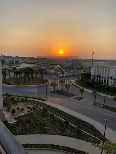 A stylish fully furnished studio for rent in The Courtyard Sodic, featuring a spacious private outdoor area with a pergola, offering comfort and privacy in one of Sheikh Zayed’s most desirable communities.