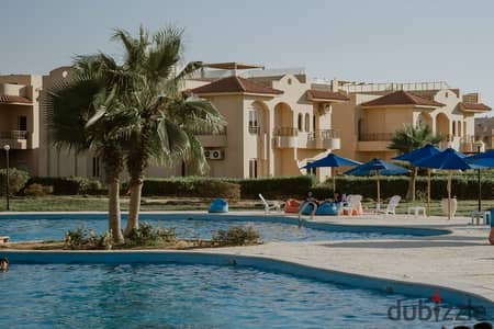 Come to the coast, receive it after 6 months, and start your investment in the North Coast. A two-bedroom chalet for sale in Ras El Hikma.