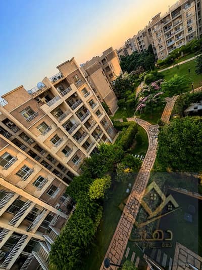 For sale in my city, an 82m apartment B7 with a garden view and The spine, super ultra finishes, excellent location in front of The spine, steps from the mosque, the market, and services in my city, New Cairo.