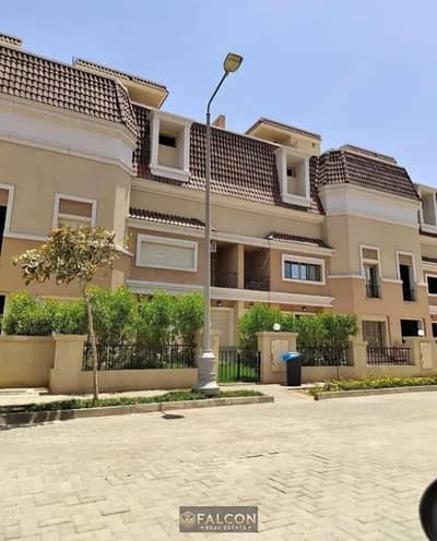 with 54% off Townhouse for sale  with private garden, with a Prime view, on Central Park direct on Suez Road, in Sarai Compound, in front of Madinaty