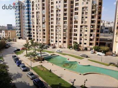 Apartment for sale in Compound Maadi Heights on the Maadi Ring Road with a lake view. The sale includes kitchen units. Area 148m consisting of 3 rooms including master - reception - kitchen - 3 bathrooms -