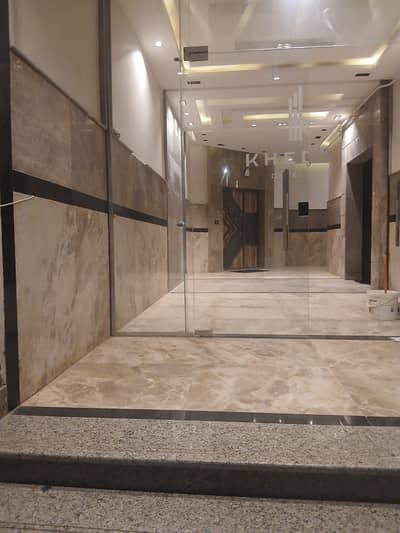Apartment for rent in the 8th District of Sheikh Zayed; features a modern finish, kitchen, and air conditioning, with a prime location and a wonderful