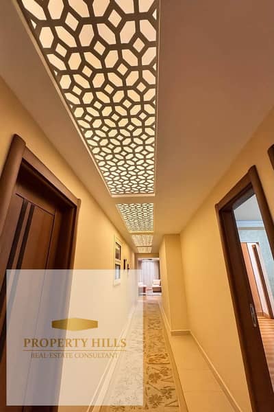 Hotel apartment for sale 179 meters finished with air conditioning inclusive (appliances - parking - gym subscription - club) in front of AUC with a special cash discount