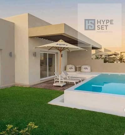 Only 500،000 ! Own a Fully Finished Chalet | Sea & Pool View in Azha | North Coast – Ras El Hekma |Near Naia Bay , Seashore , La Vista & Mountain View