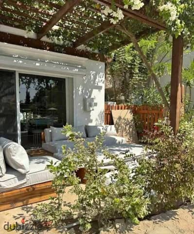 Ready-to-move-in villa for sale in Al Burouj, Shorouk. Immediate occupancy, fully finished, with a large private garden, opposite the Al Adad Medical