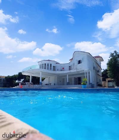 Vila Fakhira, a villa with 8 rooms, Sidi Krir K34, accommodates families, groups, with special numbers, a large garden, a basket, and table tennis.