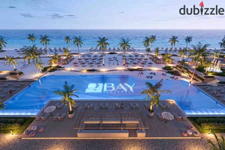 شقة للبيع 74م الساحل الشمالي - Q bay (مقدم 710,000 ج - بحري الطريق - قسط كل 3 شهور 199,000 ج)