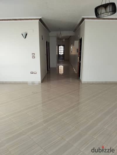 Apartment for rent in Al Banafseg 1 - First Settlement, with kitchen, on the main street opposite Swan Lake, 230 meters
