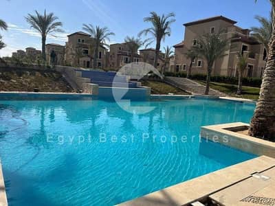 fully finished with ACs 2 two-bedroom apartment For Sale at village west Sheikh Zayed near delivery