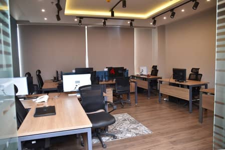 For rent: 220 sq m furnished administrative office with air conditioning, Al Jazeera Plaza, 26th of July Corridor, Sheikh Zayed
