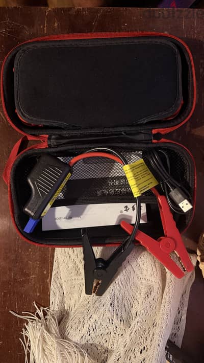 Car charger / starter / power source. شاحن سيارة محمول جديد لم يستخدم