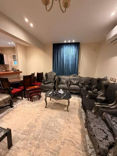 Furnished rooftop apartment for rent in Sheikh Zayed (Beit Al-Watan). It features an elevator and is fully equipped for immediate occupancy, including