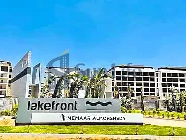 Apartment for sale in Lake Front compound in front of Magdi Yacoub Hospital - October Gardens