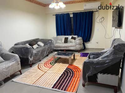 Apartment for sale, empty, Phase Two, Neighborhood One, 6 October, steps to the bus station, Al-Hosary, and the university, suitable for real estate investment.