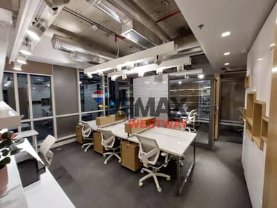 A furnished, finished office for rent directly on the axis with a plaza view مكتب للايجار متشطب مفروش علي المحور مباشره فيو بلازا