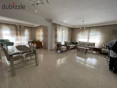 For rent in Madinaty, an apartment of 200 meters with kitchen and air conditioning, wide garden view, first floor