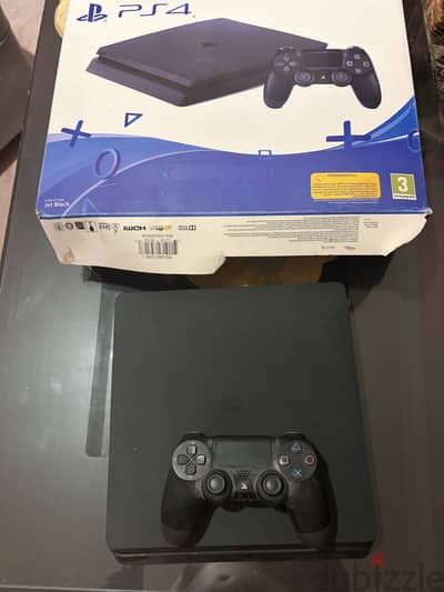 PlayStation 4 slim 500 GB with controller