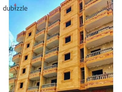 Apartment for sale with a small distinctive facade on a main street in the Pyramids Gardens