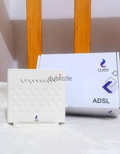 راوتر WE ADSL مستعمل بحالة ممتازة + العلبة +جميع مشتملاته.