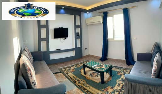 For rent, a furnished apartment on the Nile, Maadi Corniche, consisting of two bedrooms, a reception area, 2 bathrooms, and a fully air-conditioned kitchen with WiFi.