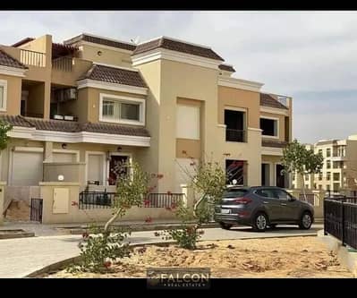 Townhouse for sale  with private garden, with a Prime view, on Central Park direct on Suez Road, in Sarai Compound, in front of Madinaty