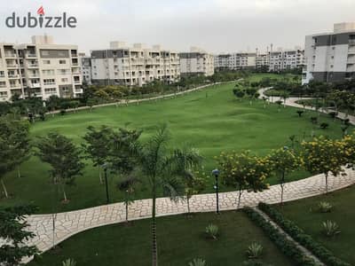 For rent in Madinaty, a 200 sq m apartment (B10) consisting of 4 bedrooms and 3 bathrooms, overlooking a large garden, at a bargain price.