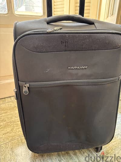 Anerican tourister kamiliant