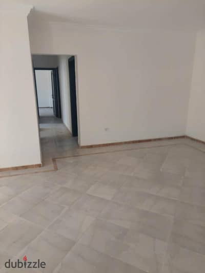 For quick sale in Masaken Misr, Exhibition Grounds area: 115 sq m apartment on the first floor (above ground floor), no elevator.