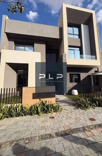 Townhouse for sale with a direct lake view in Saada Compound, New Cairo—offered with payment facilities and at an exceptional market price.