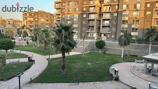 For sale, an apartment on the largest landscape in Compound Dar Misr Al-Qarnfal, New Cairo, First Assembly, directly in front of Gate 24, Al-Rehab and the Eastern Market, 130m in front of Al-Khayrat