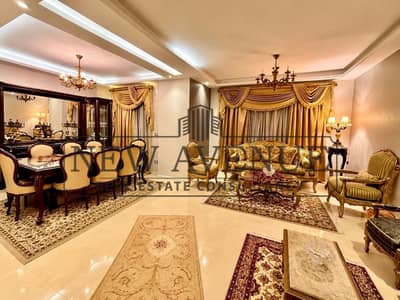 Super Lux finishing and furnished Apartment with landscape view for sale in El Banafseg Villas New Cairo