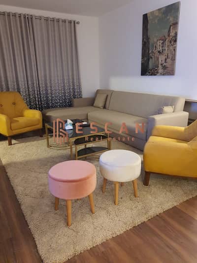 Ground floor apartment with garden for rent, furnished, in Madinaty B12, prime location, ultra-super lux finishing