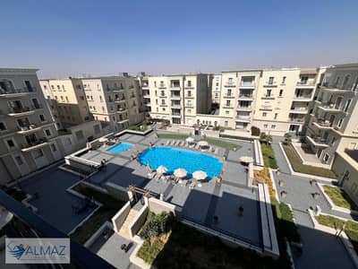 A distinctive furnished apartment of 148 square meters for rent in Mivida Compound, Fifth Settlement, with an excellent view of the swimming pool.