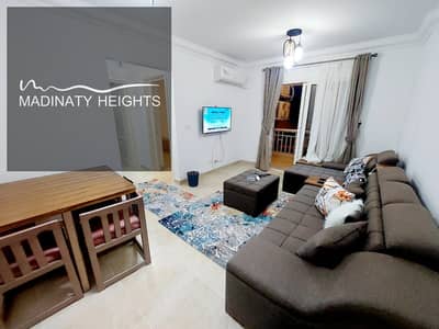 Furnished apartment for rent in Madinaty B12  78 meters  2 bedrooms and 2 bathrooms and reception and kitchen  Fourth floor  Fully air-conditioned  Modern appliances  Modern furniture  Required price  25 thousand pounds minimum rent period of one year