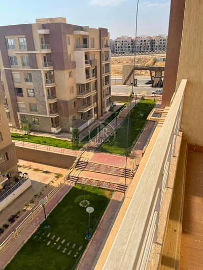 Apartment for sale in Dar Misr Al-Andalus (Phase 1, Building 70), featuring a garden view.