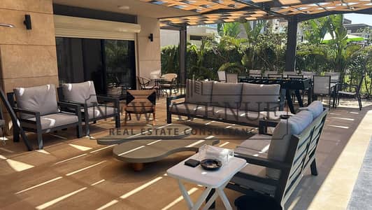 For sale Fully Furnished Twin house for sale 3rd row lagoon with partial sea view in swan lake north coast by Hassan Allam