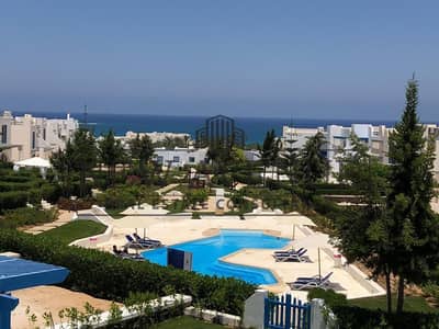 Distinctive fully Finished ground chalet direct on lagoon for sale without over in mountain view ras elhikma with open view