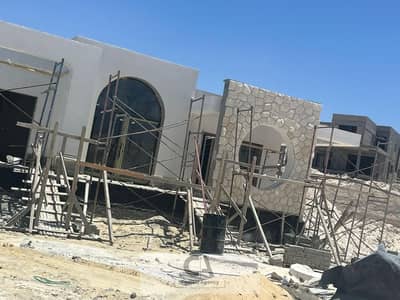2-bedroom chalet for sale at The Med, Ras El Hekma—fully finished. Installments up to 10 years with only a 5% down payment. Book at the best price wit