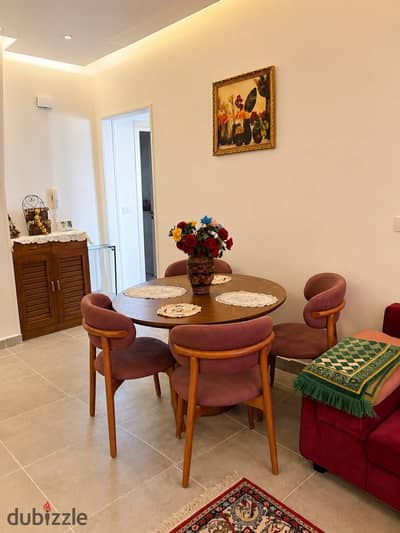 Furnished apartment for rent in Celia Compound, the Administrative Capital. Two bedrooms and a bathroom with premium finishing, fully air-conditioned.