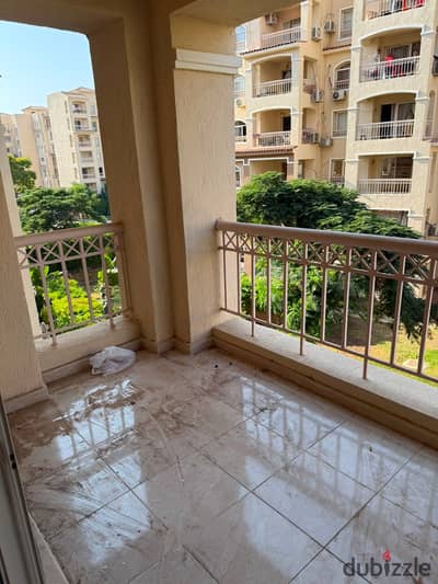 An exceptional opportunity in Madinaty: a 175m² apartment (Model 300) in Phase B1. It features a stunning, unobstructed garden view and a prime northe