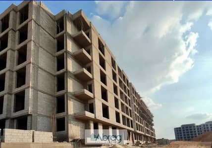Two-bedroom ground floor apartment for sale, two-year delivery, with payment plans up to 7 years, in Rovan Compound, Sheikh Zayed.