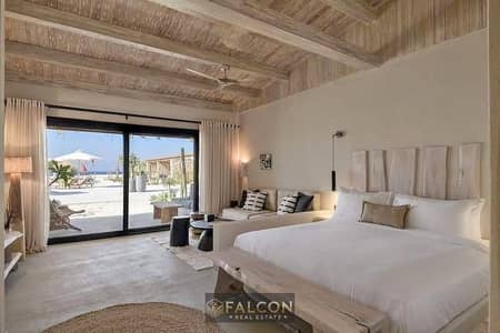 with nobu srvices finsihed sea view chalet for sale  in 8y installment in ogami sodic near ceaser and modon and lavista raselhekma near hacienda