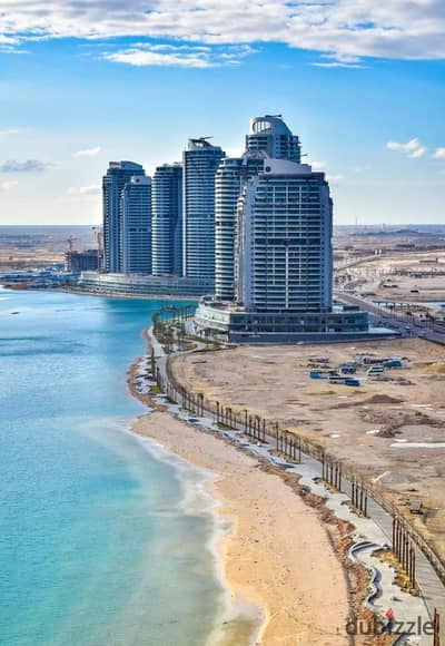 Chalet for sale with direct sea and lagoon views in New Alamein Towers. Fully finished with air conditioning.