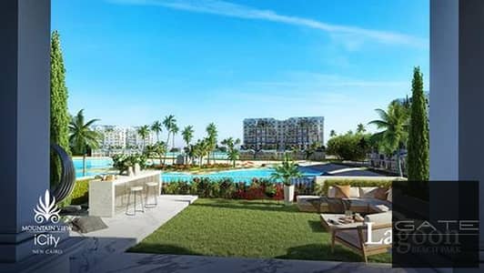 Apartment for sale directly overlooking the lagoon in Mountain View iCity New Cairo (Lagoon Phase) | Corner unit Apartment for sale directly overlooking the lagoon in Mountain View iCity New Cairo (Lagoon Phase) | Corner unit