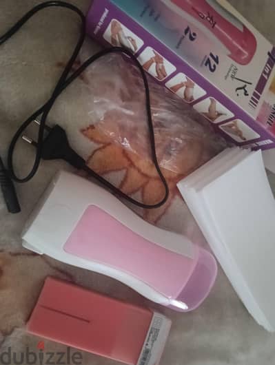 ماكينة إزالة شعر بالشمع