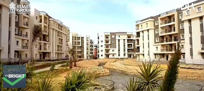 Apartment with garden for sale inside Isola Sheraton near Cairo Airport and the Suez Road, delivery in less than a year and installment over 8 years