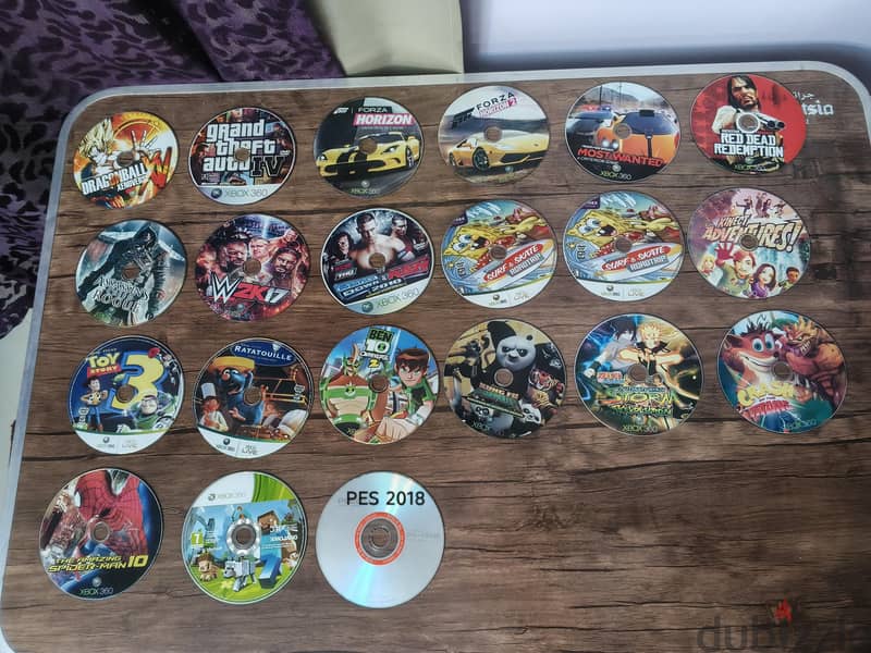 xbox 360 slim 23 Games CD and 2 controllers 2