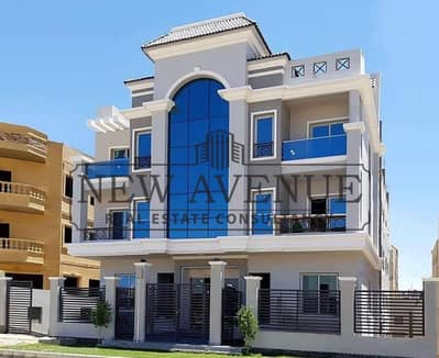 Apartment with garden for sale in El Hay 4 Shorouq 2 fully furnished with ACs ready to move in a prime Bahari location with garage