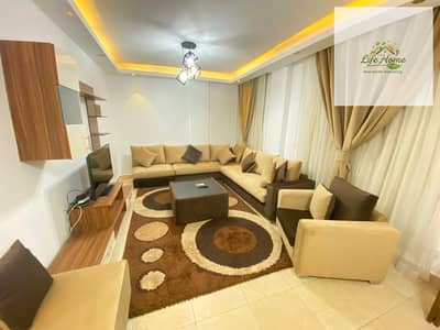 Furnished apartment for rent in Al Rehab, three bedrooms, near the old market